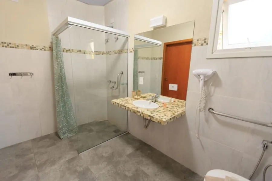 Spacious accessible bungalow bathroom layout