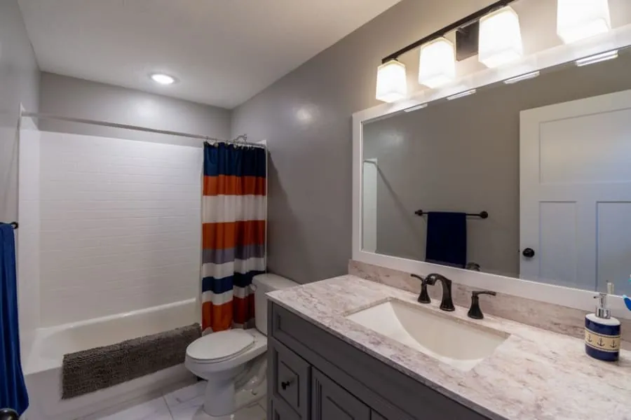 Finished relocated bathroom in a Derby home with modern grey fittings