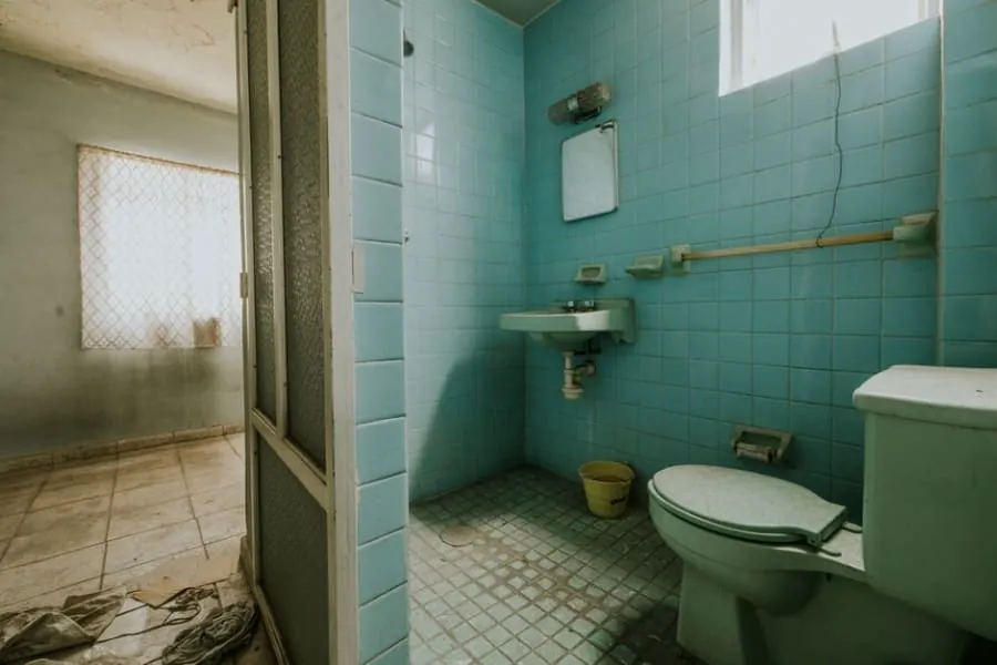 Dated original bungalow bathroom before renovation