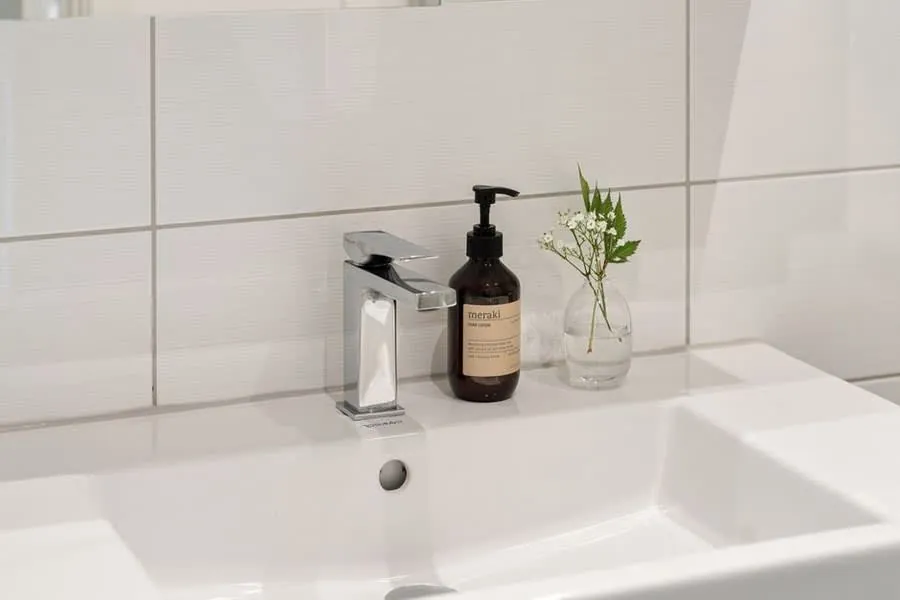 Basin and mixer tap fitted as part of a bathroom installation in Derby