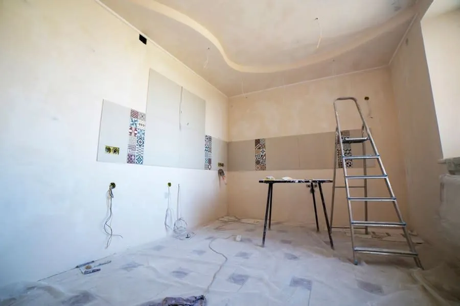Derby bathroom part-way through a strip-out with tools and materials in place