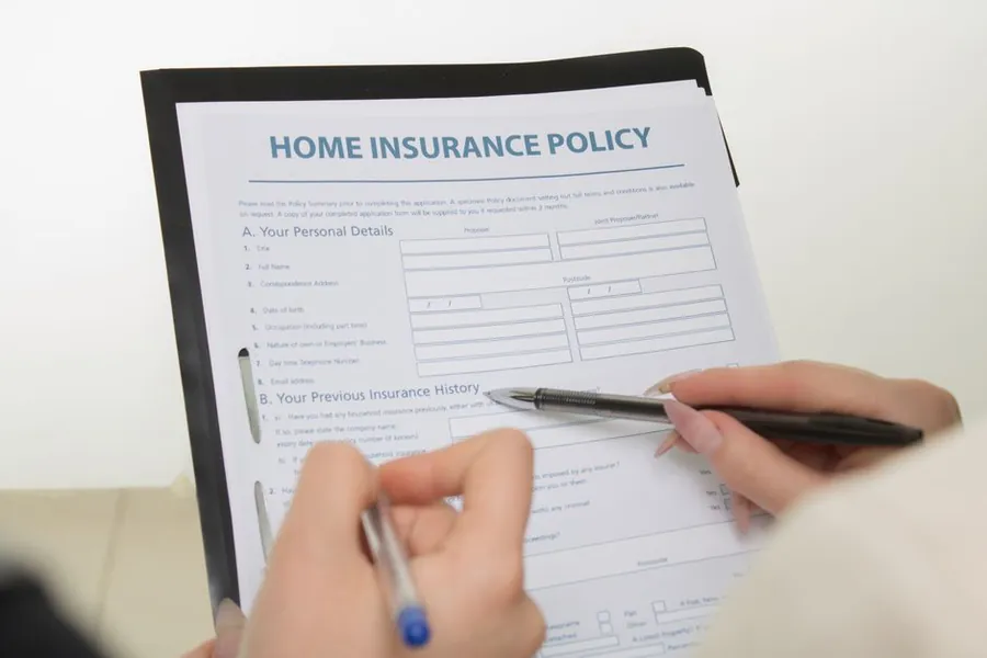 Reviewing a home insurance policy after a bathroom renovation water damage claim in Derby