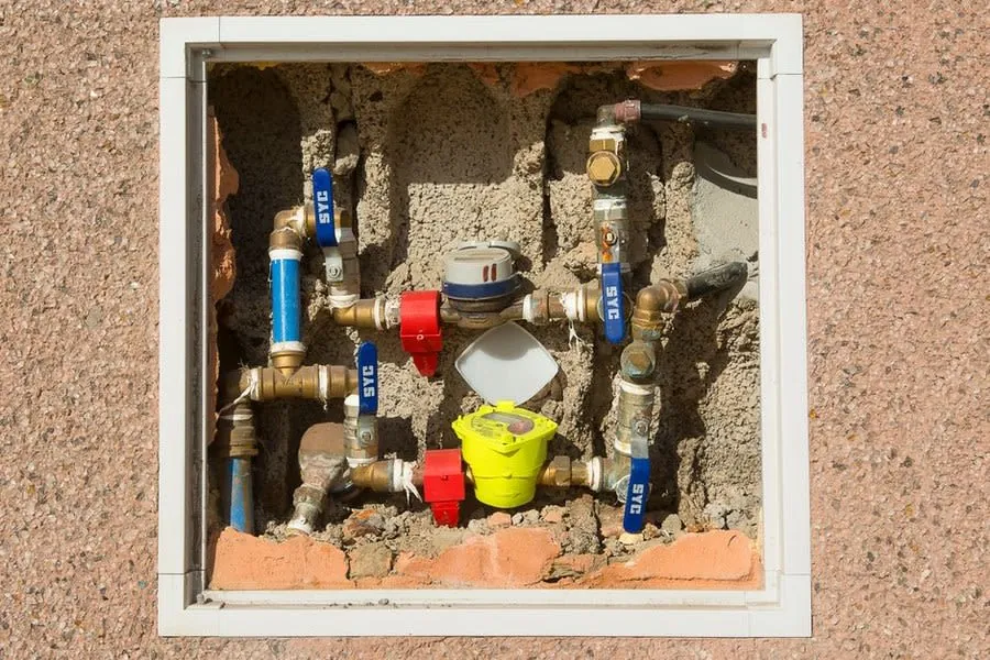 Mains water supply pipework and stop valve serving a Derby property