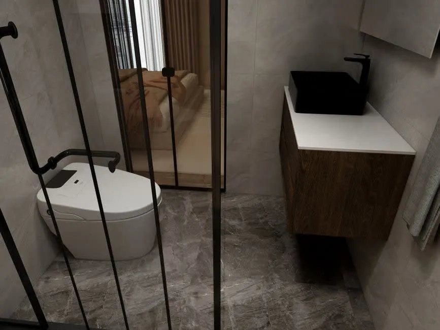 Compact en-suite shower room in a Derby home where wall panels often suit better than tiles