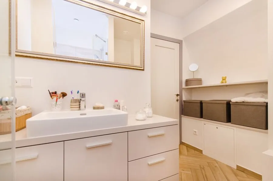 Bathroom vanity unit and shelving providing family storage