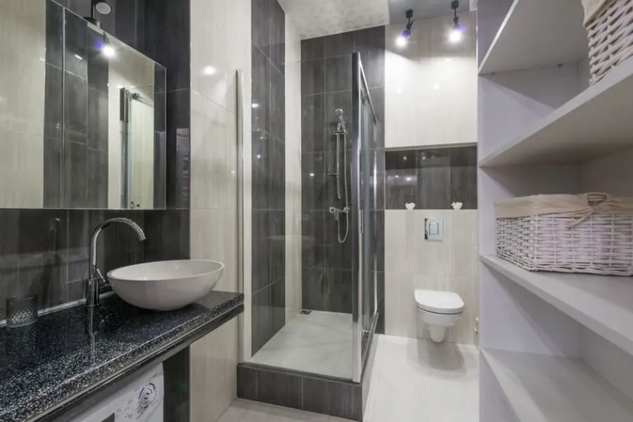 Porcelain and ceramic tiles on a contemporary bathroom wall