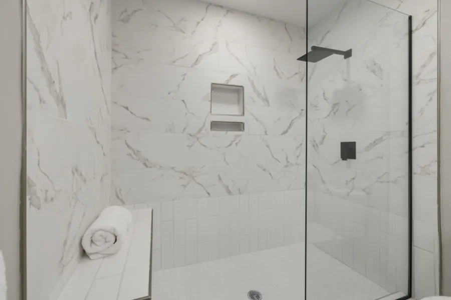 Tiled recessed niche in a Derby shower for storage