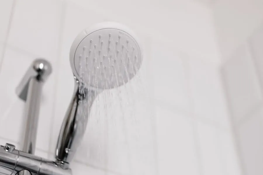 Shower running in a newly fitted Derby bathroom during a snagging check
