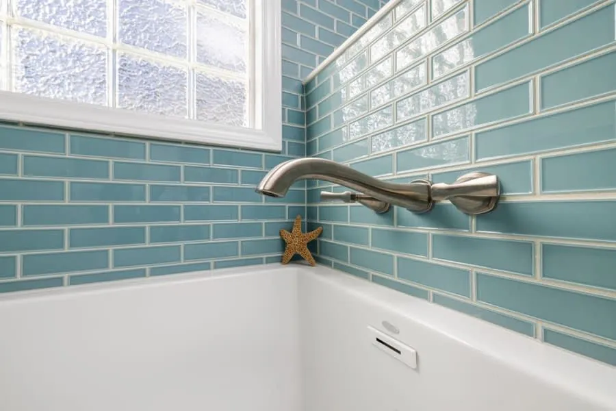 Close inspection of tile alignment and grout lines in a Derby bathroom