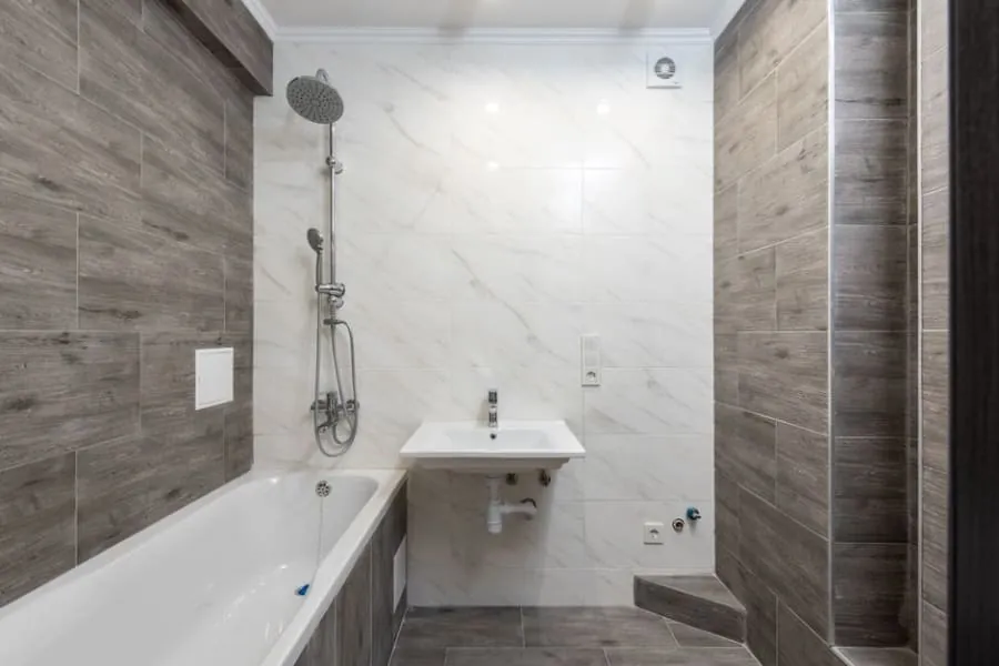 Textured, slip-resistant floor tiling in a walk-in shower