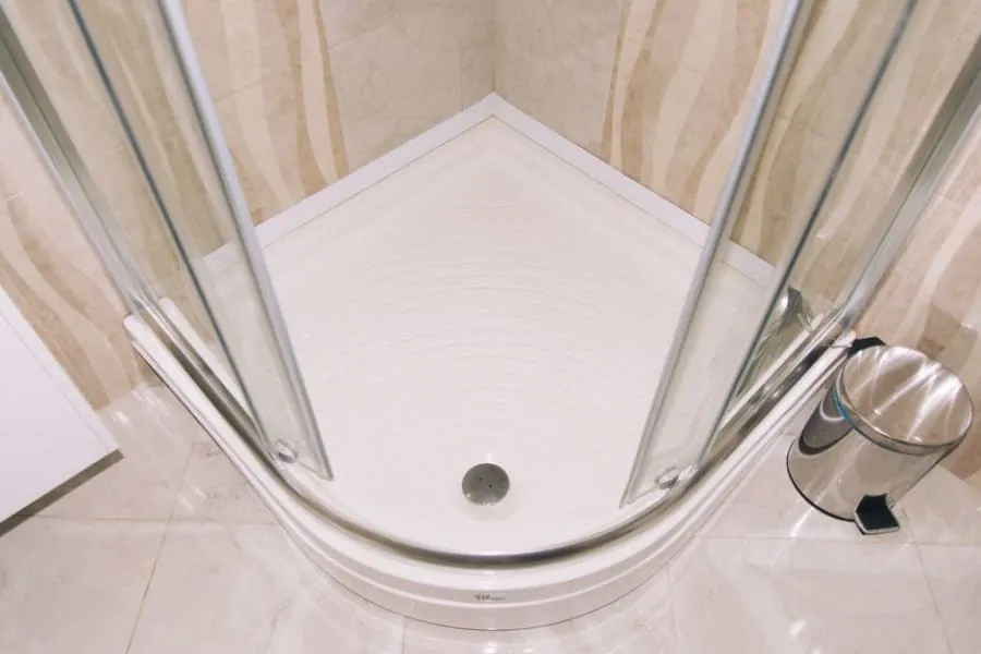 Low-profile walk-in shower tray in a modern bathroom