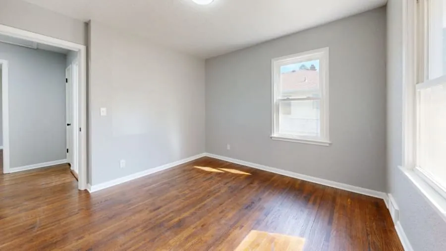 Empty room being prepared before a bathroom is relocated into it