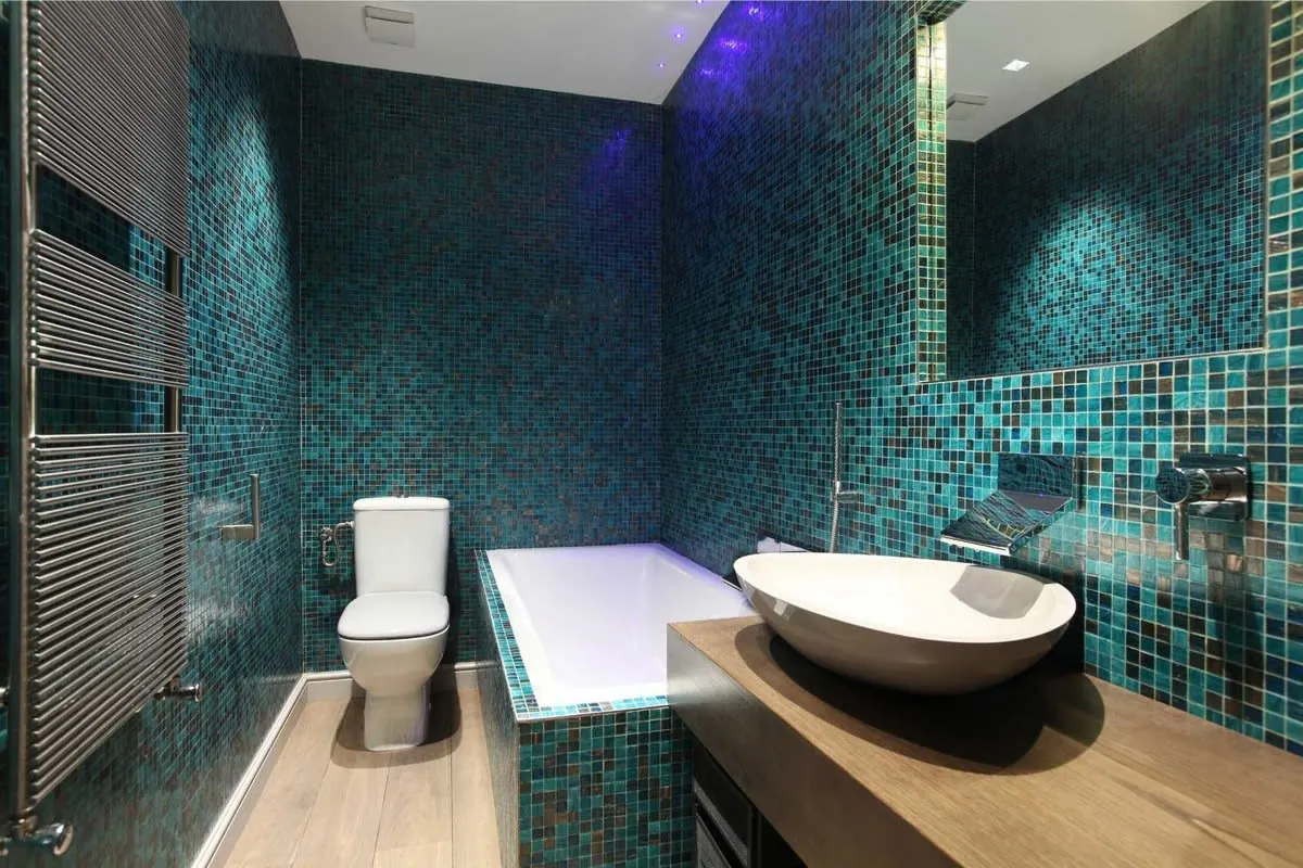 Modern tiled en-suite in a Derby home with a walk-in shower