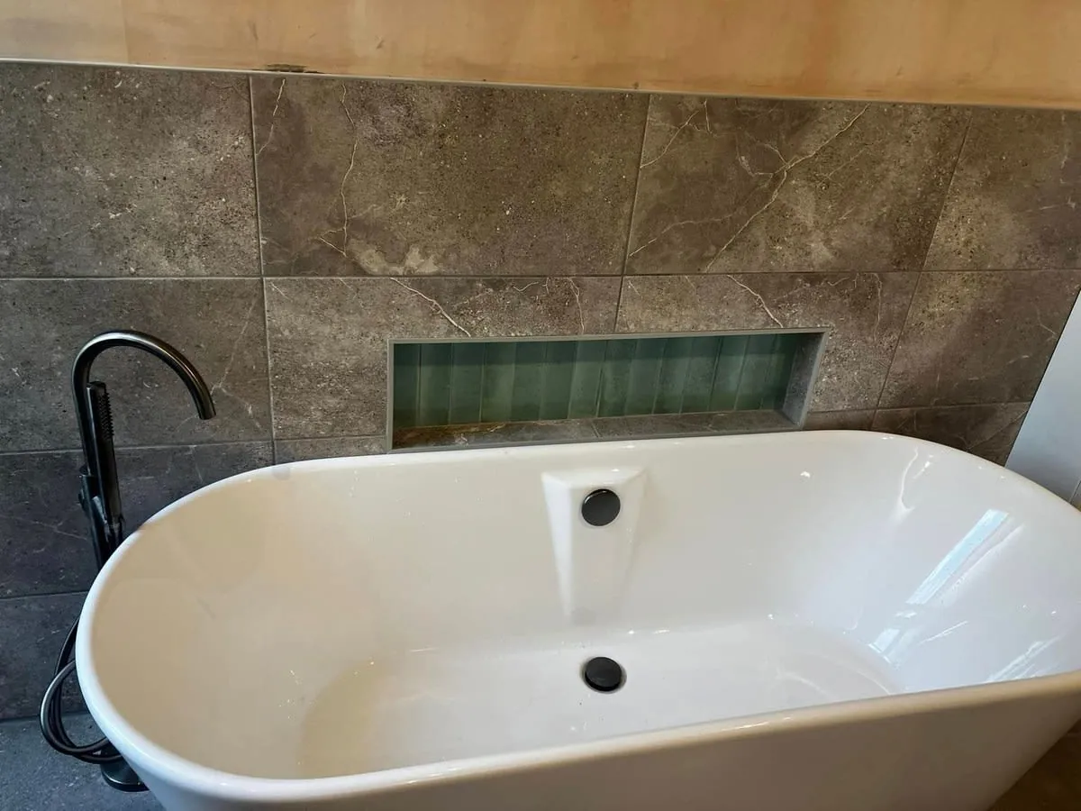 White bath fitted in a Derby home bathroom